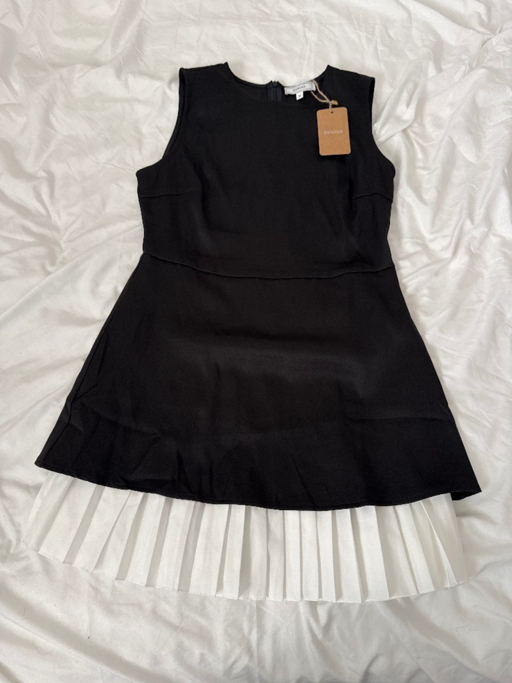rihoas black dress   size medium   details: -NWT -hidden back zipper  -built in
